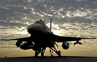 200px-F-16_by_dawn.jpg