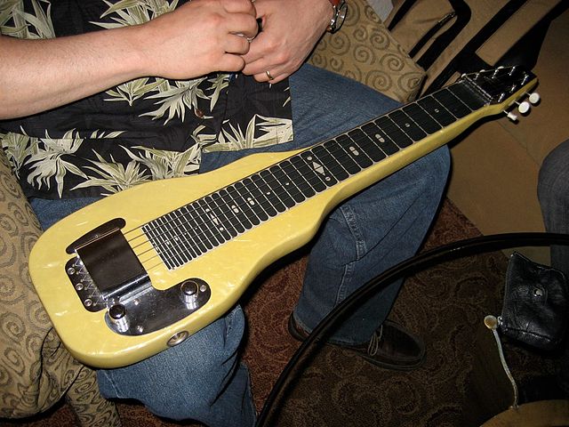 An electric lap steel guitar. Note that the instrument bears only token resemblance to the traditional guitar shape.