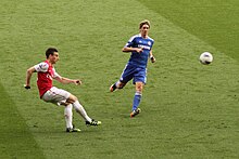 Koscielny and Fernando Torres in a Premier League match on 21 April 2012 Fernando Torres & Laurent Koscielny 2.jpg