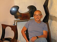 Gerard Tsutakawa with some of his smaller artworks at home studio