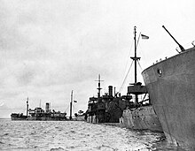 Gooseberry line of ships used as artificial harbor breakwater in June of 1944 GooseberryJune1944.jpg