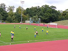 Whitstable (yellow shirts) take on Guildford City in a 2006 FA Cup tie