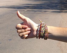 A typical hitchhiker's thumb gesture Hitchhiker's gesture.jpg