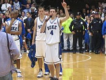 Redick speaking to the crowd after his final game at Cameron Indoor Stadium
