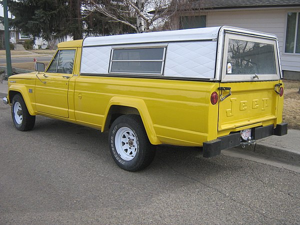 Long-wheelbase J300 with aftermarket cargo bed cap