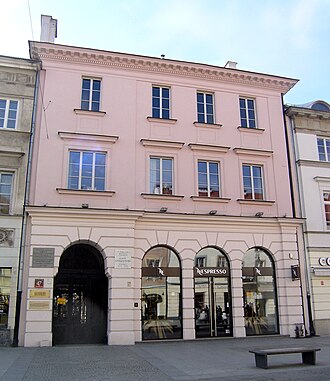 Nowy Świat 47, Warsaw, where Apollo Korzeniowski lived in 1861 with his wife and three-year-old son Konrad (the future novelist Joseph Conrad).  In front is a Chopin's Warsaw bench.