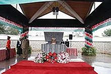 Kenyan flags at the Kenyatta Mausoleum Kenyatta Mausoleum (1295043494).jpg