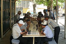 Kyrgyz men playing chess in Osh.jpg