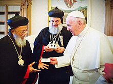 Catholicos Baselios Thomas I with Patriarch Ignatius Aphrem II of Antioch and Pope Francis of Rome Leaders Of SOC and RC.jpg