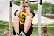 Member of the Maryland Army National Guard demonstrating the leg-tuck event of the ACFT Leg-tuck Army Combat Fitness Test.jpg