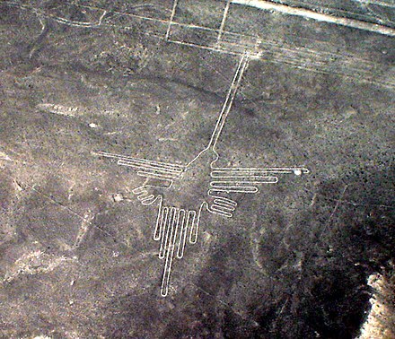 The Nazca Lines in Peru. This photograph shows a depiction of a hummingbird