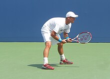 Lleyton Hewitt preparing to return a service Lleyton Hewitt practice.JPG