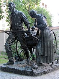 The Handcart Pioneer Monument, by Torleif S. Knaphus, located on Temple Square in Salt Lake City, Utah Mormon Pioneer handcart statue.jpg