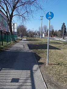 A shared-use path in Budapest, with a typical European shared use sign Nagytetenyi Road, shared path sign, 2021 Nagyteteny.jpg