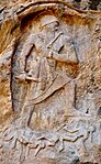 Rock relief image at Darband-i-Gawr originally thought to be of Naram-Sin but since in dispute.[59][60]