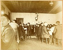 Young boys eating in the dining hall Native American boarding school-Young boys eating in the dining hall.jpg