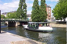 The Jules Verne on the River Erdre in central Nantes, operating the Navibus Erdre service. Navibus Jules Verne on the River Erdre in Nantes.jpg