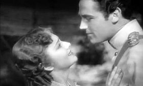 Olivia de Havilland a Errol Flynn v traileru The Charge of the Light Brigade.JPG