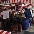 * Nomination Street food at Plaza Solidaridad Market near Alameda Central park: meat stand. By User:Jarekt --Jarekt 17:47, 22 July 2015 (UTC) * Decline Too much going on, especially with the dark area in the bottom and the blown CFL at the top. Perhaps cropping into the seller and buyer would be better? --Daniel Case 19:03, 25 July 2015 (UTC)