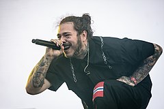 Image 1Post Malone performing on the main stage at Stavernfestivalen in 2018 (from 2010s in music)