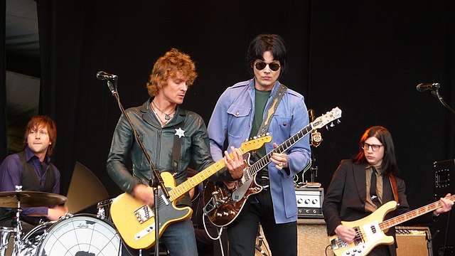 The Raconteurs performing in 2008.