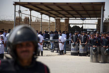 Riot police outside Mubarak courthouse.jpg