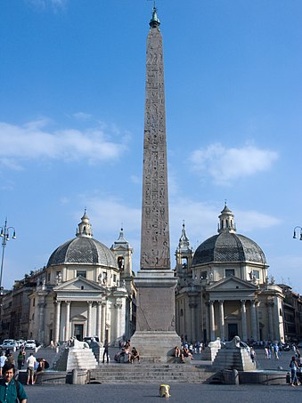 An Egyptian obelisk of Ramesses II from Heliopolis stands in the centre of the Piazza.