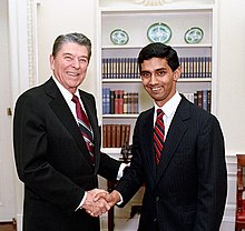 D'Souza greeting President Ronald Reagan in 1988