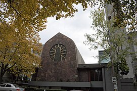 That church was replaced by a modernist building, with a chapel completed in 1962…