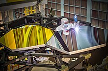 The Pathfinder for the James Webb Space Telescope shown here with extra mirrors on a non-flight test unit of the backplane Silver and Gold (15224577939).jpg