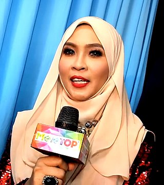 <span class="mw-page-title-main">Siti Nordiana</span> Malaysian singer and songwriter (born 1984)