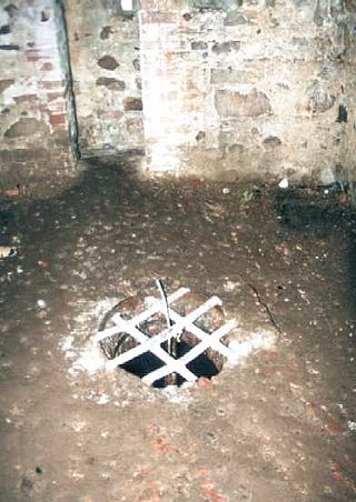 <i>Angstloch</i> Floor hole in medieval castles that led to a cellar or basement