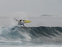 Surfing at Lohi's break kaafu atoll maldives.jpg