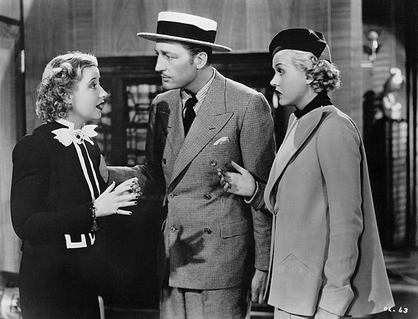 Genevieve Tobin (left) as Della Street, with Warren William and Patricia Ellis in The Case of the Lucky Legs (1935)