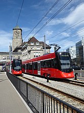 Nebenbahnhof mit zwei Zügen der Appenzeller Bahnen nach Appenzell und rechts nach Trogen.