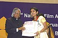 The President Dr. A.P.J. Abdul Kalam presenting the Best Film Actress Award for the year 2004 to Ms. Meera Jasmine for her role in “Padam Onnu Oru Vilapam” at the 51st National Film Award function in New Delhi.jpg