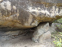 Cave and the carving Thirakoil-cave and carving.JPG