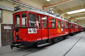 Two N railcars with an N sidecar coupled between them in the Remise Transport Museum