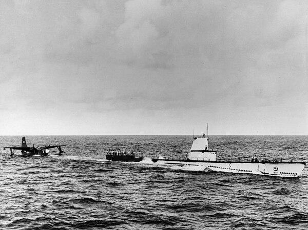 Guavina (AGSS-362), refueling a P5M Marlin flying boat off Norfolk, VA. in 1955. It was planned to use submarines to refuel the new jet-powered P6M Se