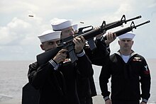 Navy firing detail as part of a burial-at-sea in 2008, for one of the 316 survivors of Indianapolis sinking on 30 July 1945 USS Ohio firing detail.jpg