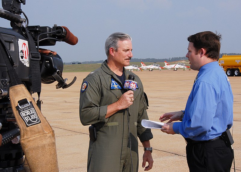 File:US Navy 070524-N-8825R-001 Wade Phillips of WTOK-TV interviews Commander, Training Air Wing (TW) 1, Capt. Curt Goldacker during a live newscast held on the flight line of the TW-1 jet hanger.jpg