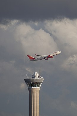 VT- A330 and LFPG tower (4542837408).jpg