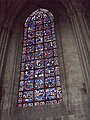 Photo du vitrail de saint Julien l'Hospitalier dans le déambulatoire nord