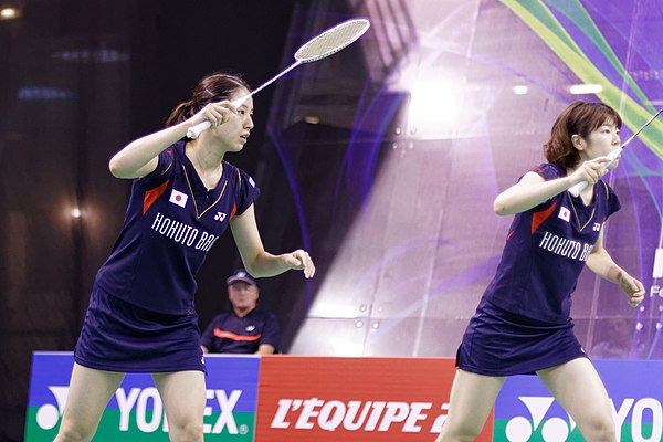 Koharu Yonemoto (left) and her women's doubles partner Yuriko Miki (right) at the 2013 French Super Series