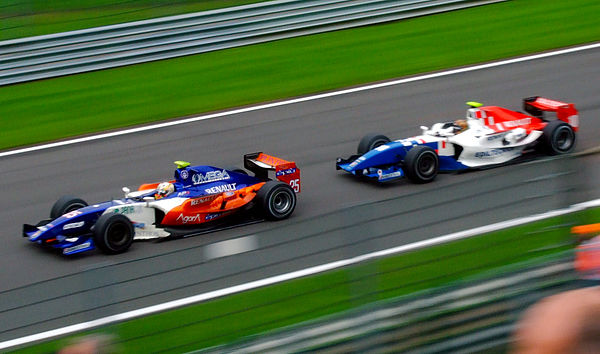 Trident driver Adrian Zaugg leads iSport's Davide Valsecchi at the Spa-Francorchamps round of the 2010 season.