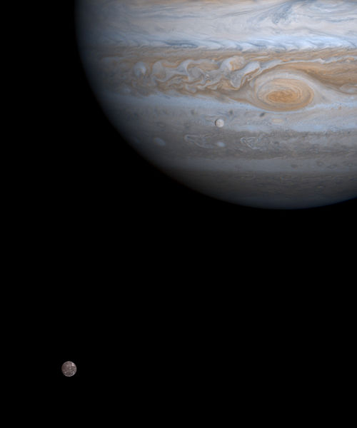 Callisto (bottom left), Jupiter (top right) and Europa (below and left of Jupiter's Great Red Spot) as viewed by Cassini–Huygens