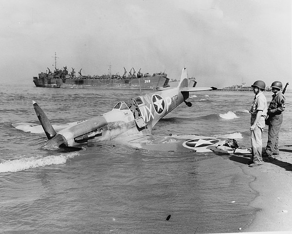 A Spitfire from the 307th Fighter Squadron, flown by Major Virgil C Fields, that crash-landed on the beach at Salerno, Italy after being damaged by a 