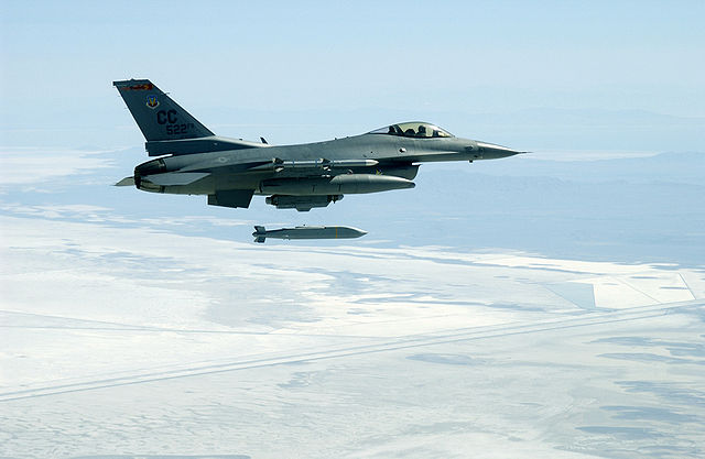 An F-16C releases an AGM-154 JSOW. The AGM-154 JSOW has a range of 12 nmi (22 km) for a low altitude launch, or 70 nmi (130 km) for a high altitude la