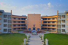 The school building was designed by Mr. Zeeshan of Lahore and resembles a crescent, depicting Pakistan's Islamic heritage. AISS campus. - Lahore, Pakistan.jpg