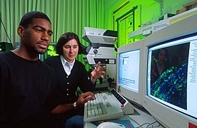 Graduate student Abdulah Harris, microbiologist Amy Charkowski